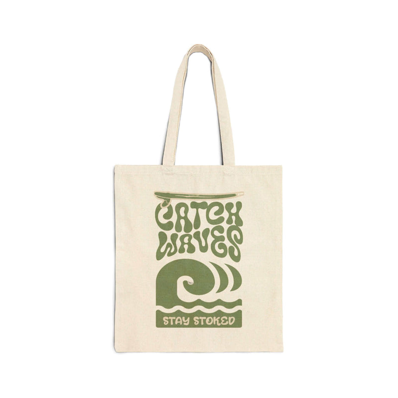 "Catch Waves Stay Stoked canvas tote bag with 'Make Waves' design, featuring durable canvas material and twin carry handles."