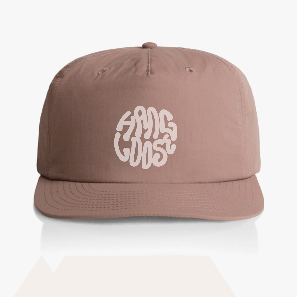 Hazy pink surf cap with "Hang Loose" logo, made from 100% recycled nylon, perfect for surfing and outdoor activities.