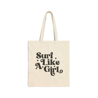 Surf Like a Girl Canvas Tote Bag with black text on beige organic cotton, ideal for beach essentials, twin handles, 15x16 inches.