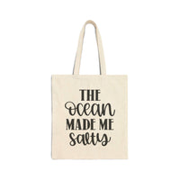 The Ocean Made Me Salty Canvas Tote Bag with black lettering, 100% organic cotton, twin carry handles, flat corners, double side design